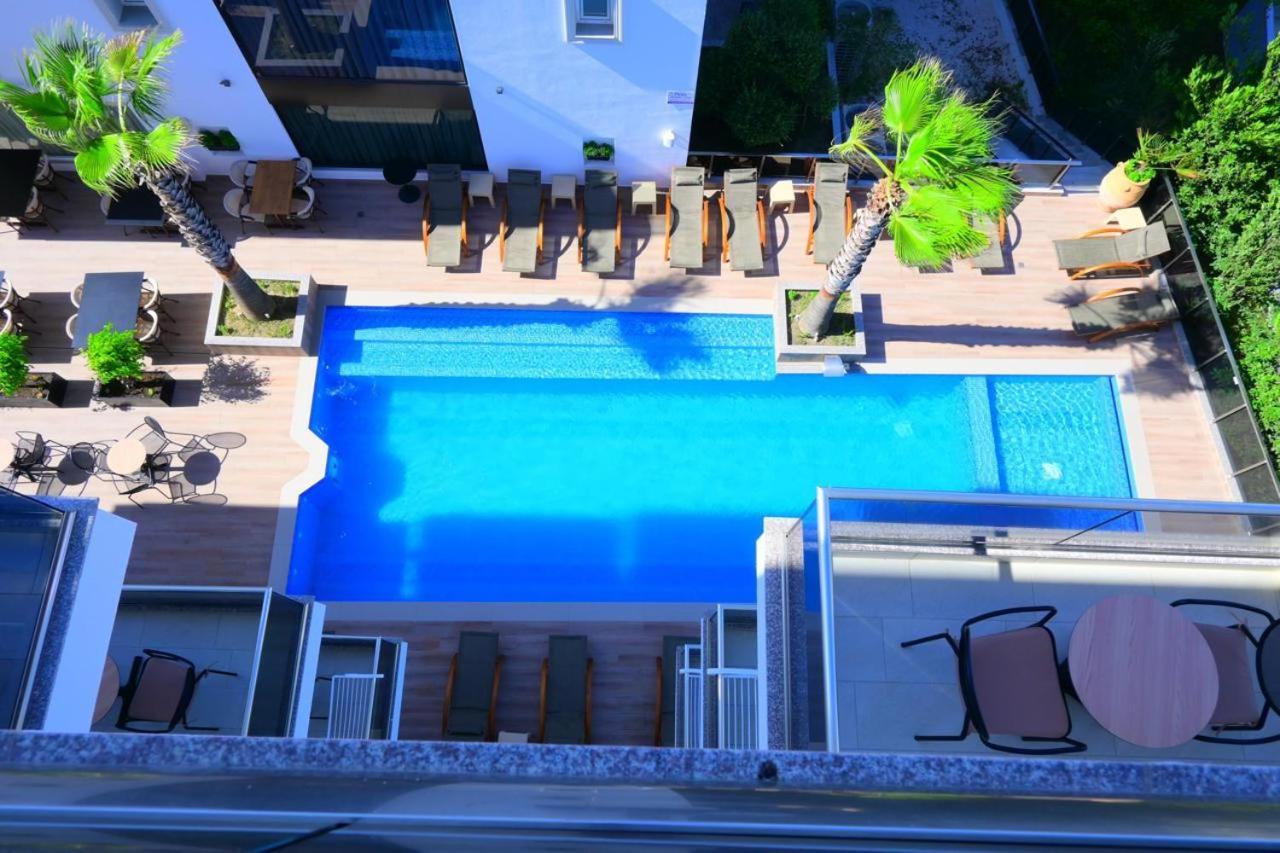 L'Amo Del Mare Hotel Ксамил Екстериор снимка